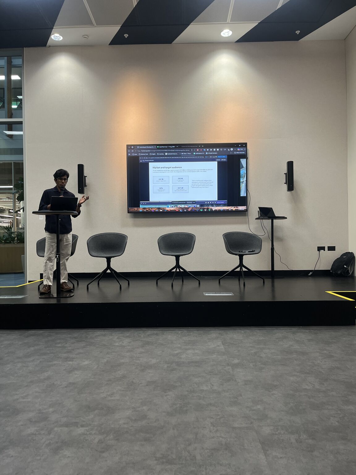 Event speaker presenting to the room
