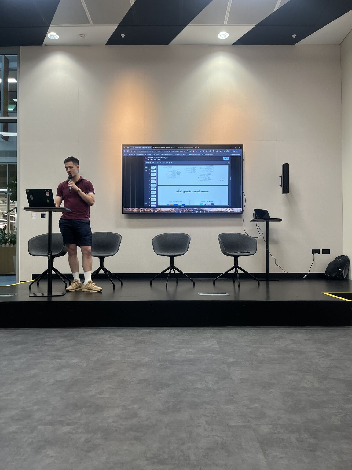 Founder on stage at Build Pitch Fund